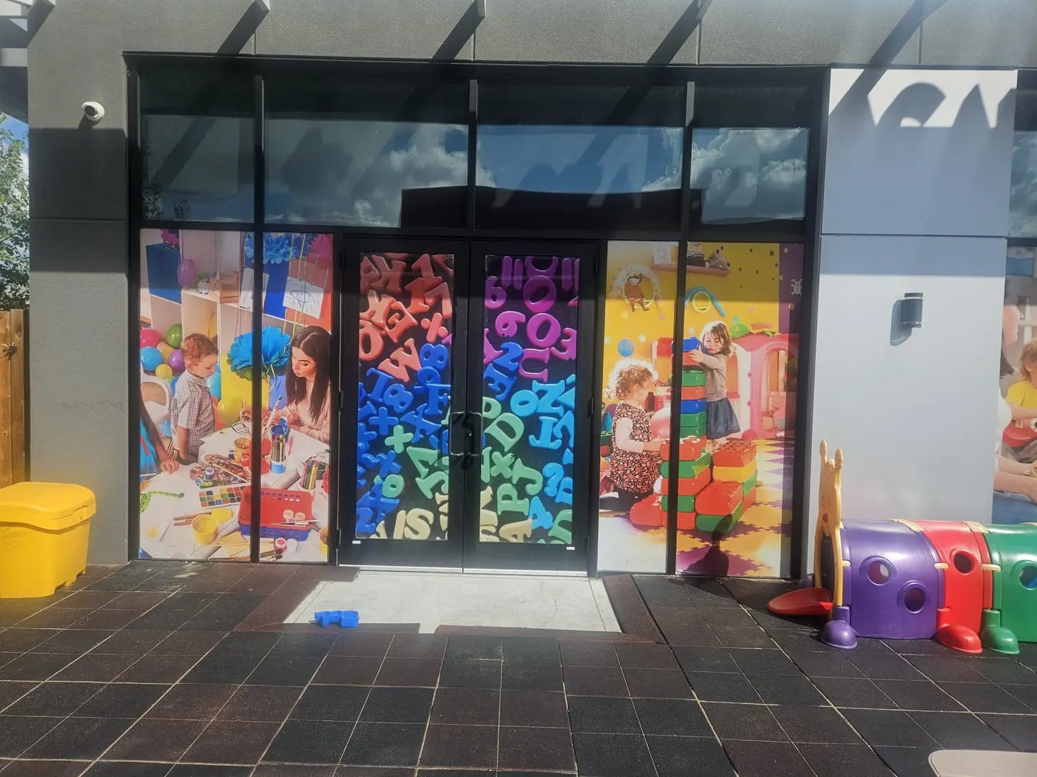 Full-colour printed window graphics on a daycare entrance