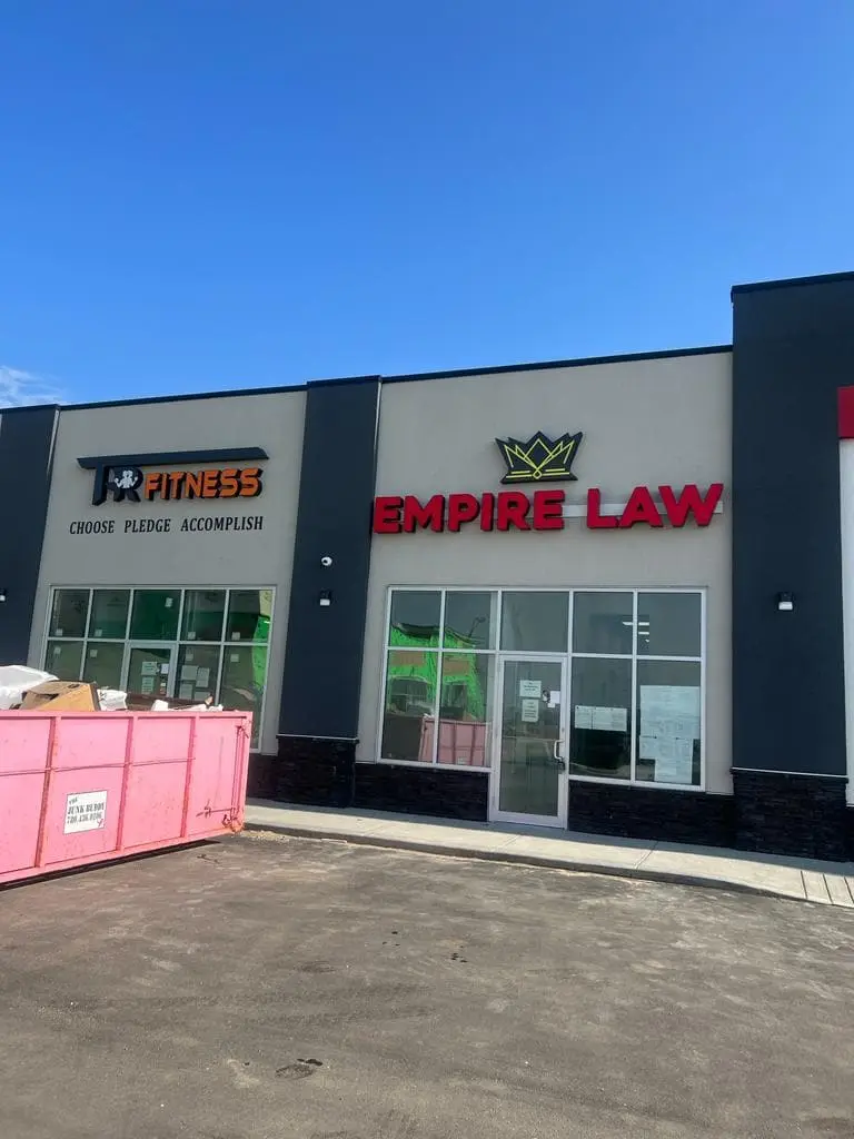 Empire Law red channel letters with crown logo