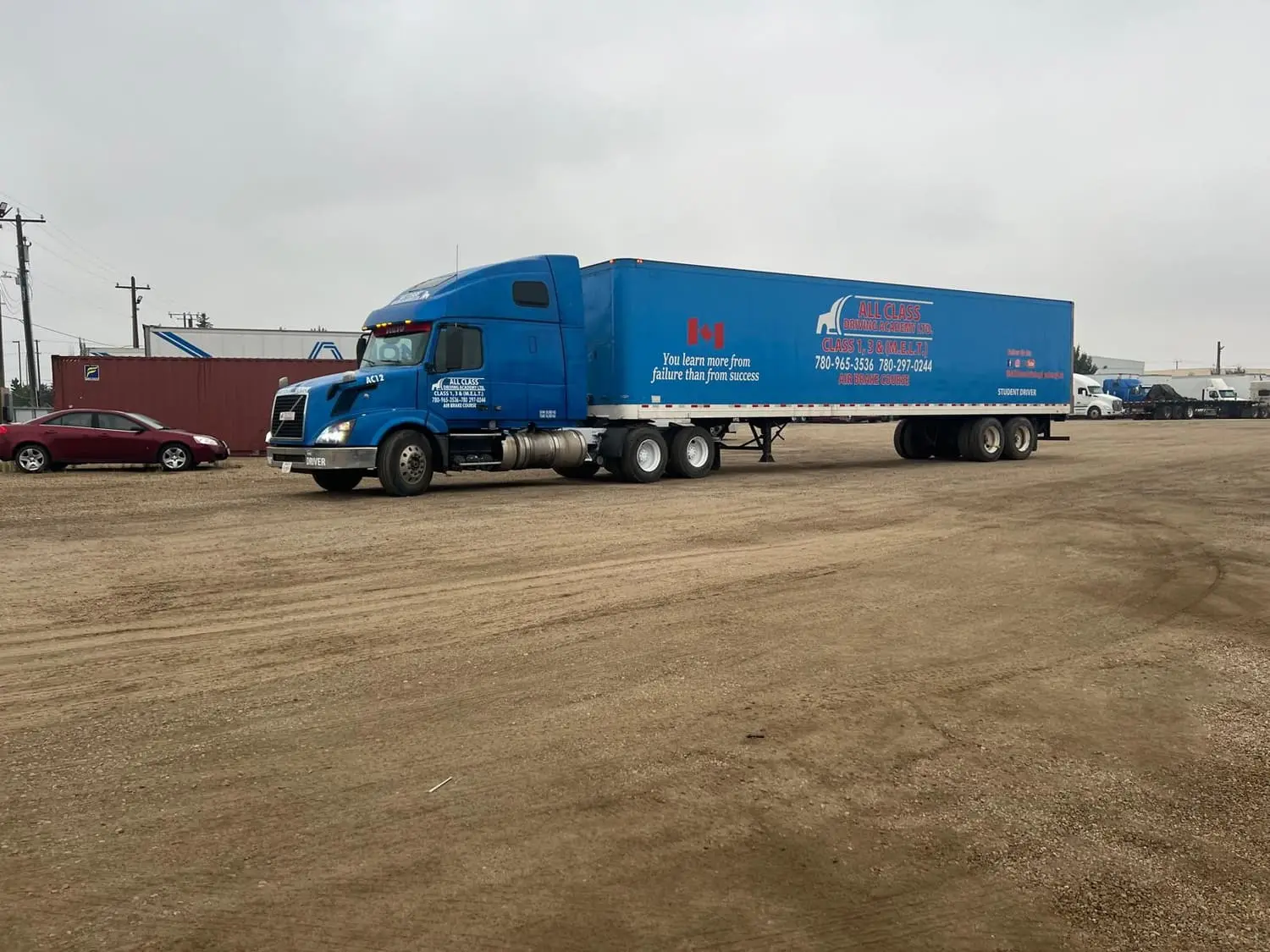 Highway tractor and trailer with fleet lettering