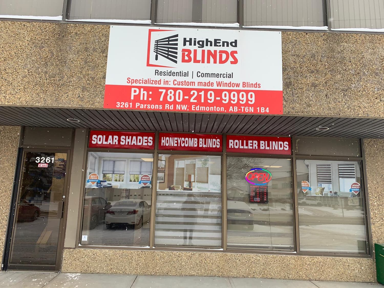 HighEnd Blinds storefront sign and window headers