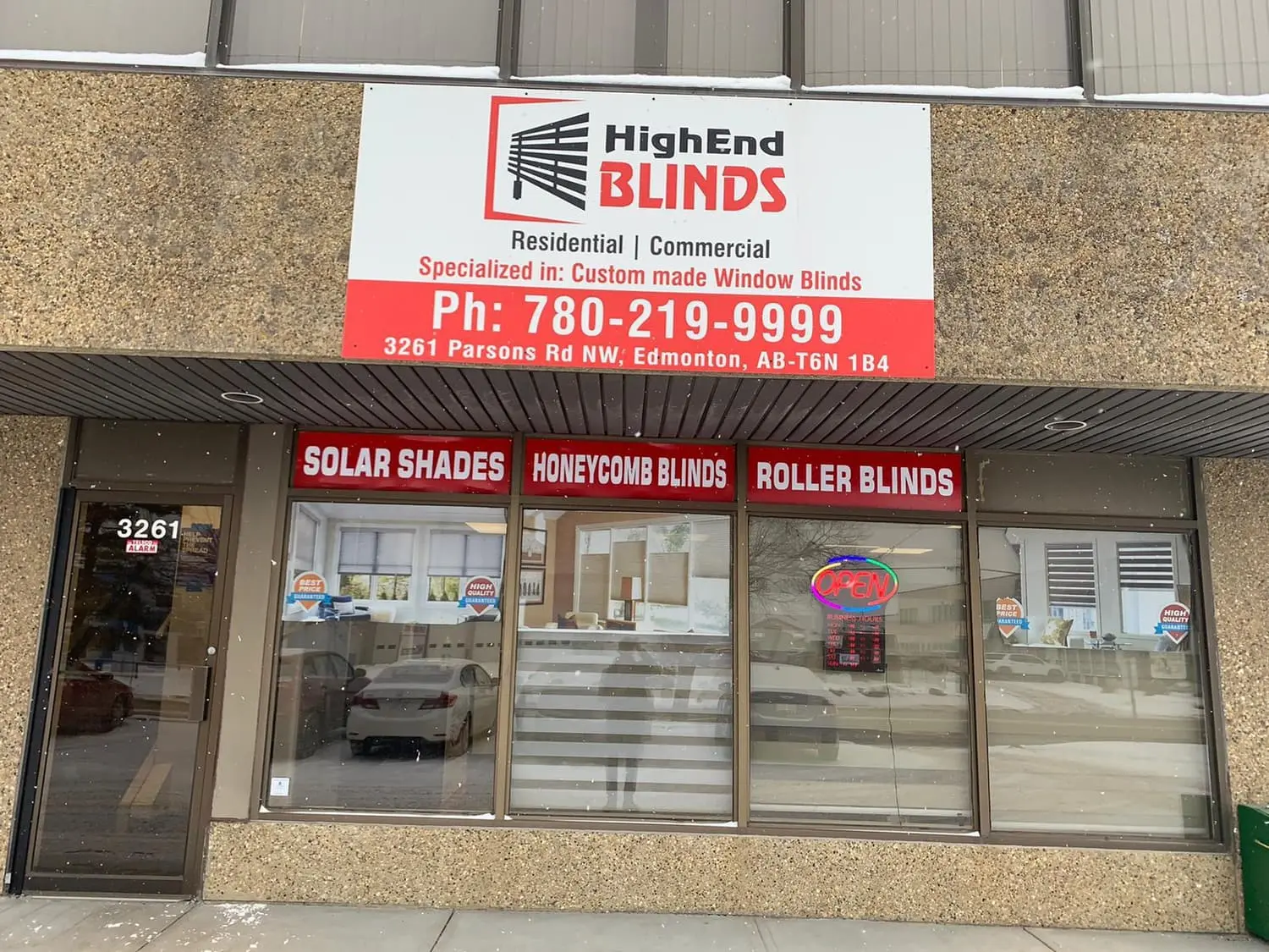 HighEnd Blinds storefront sign and window headers