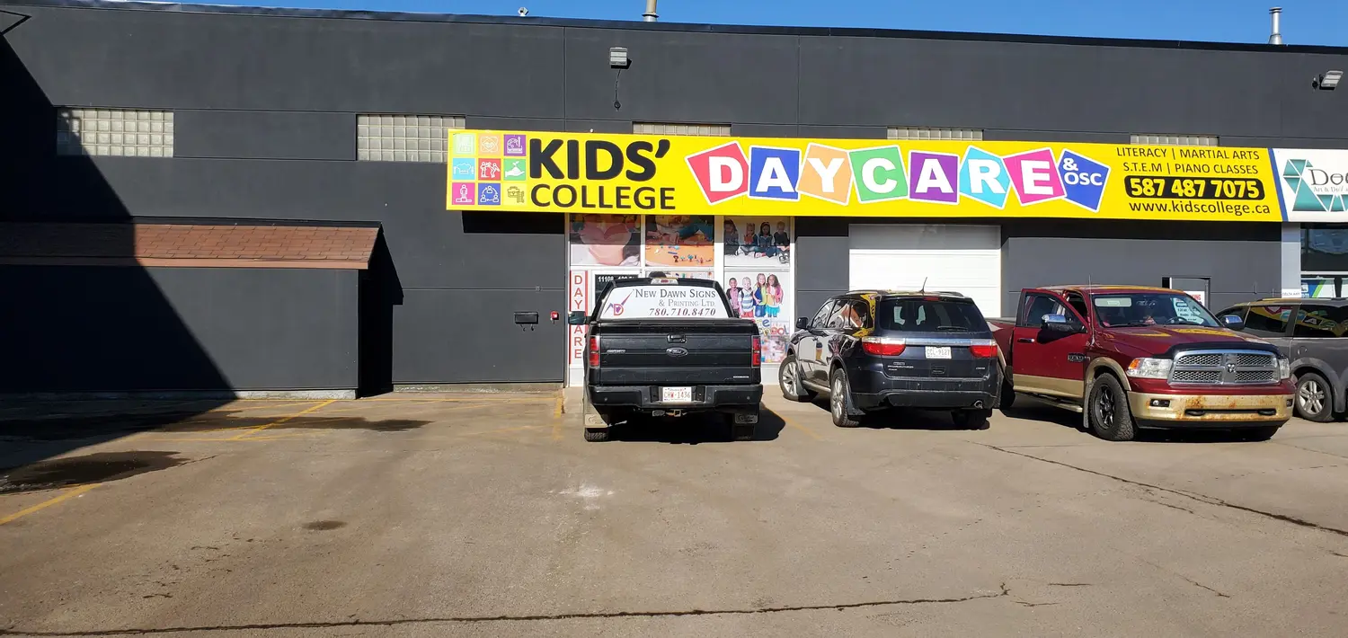 Kids College Daycare bright yellow awning with printed graphics and full window graphics
