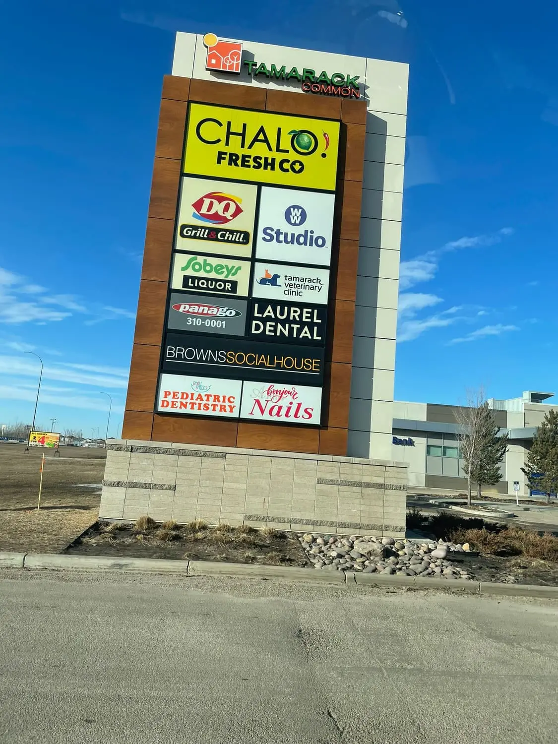 Multi-tenant plaza pylon with DQ, Sobeys and other panels